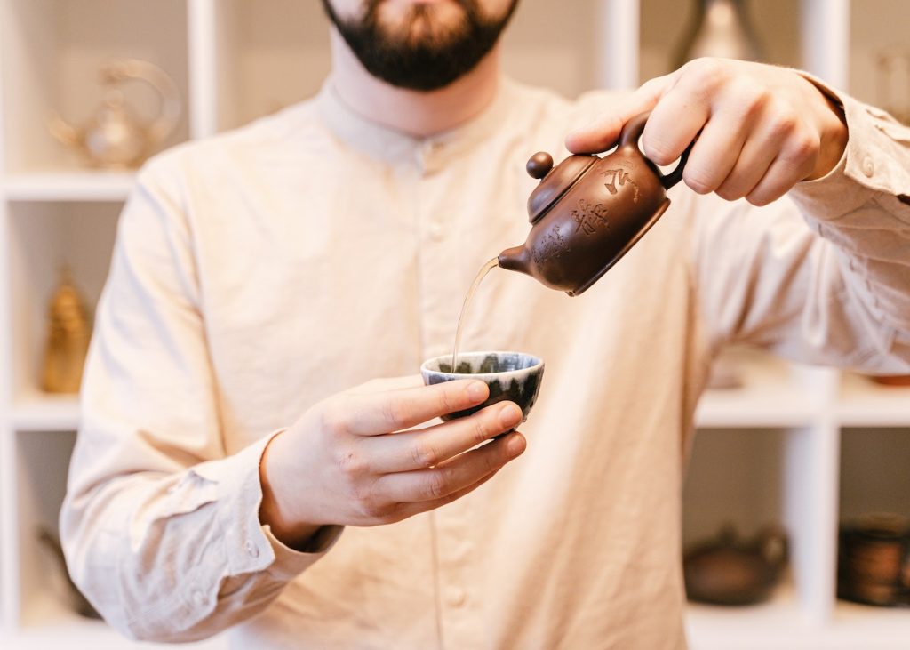 Pour Pu-erh tea into a cup